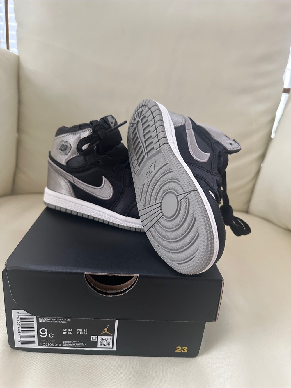 Nike Air Jordan 1 Mid Black and Metallic Silver/Gray